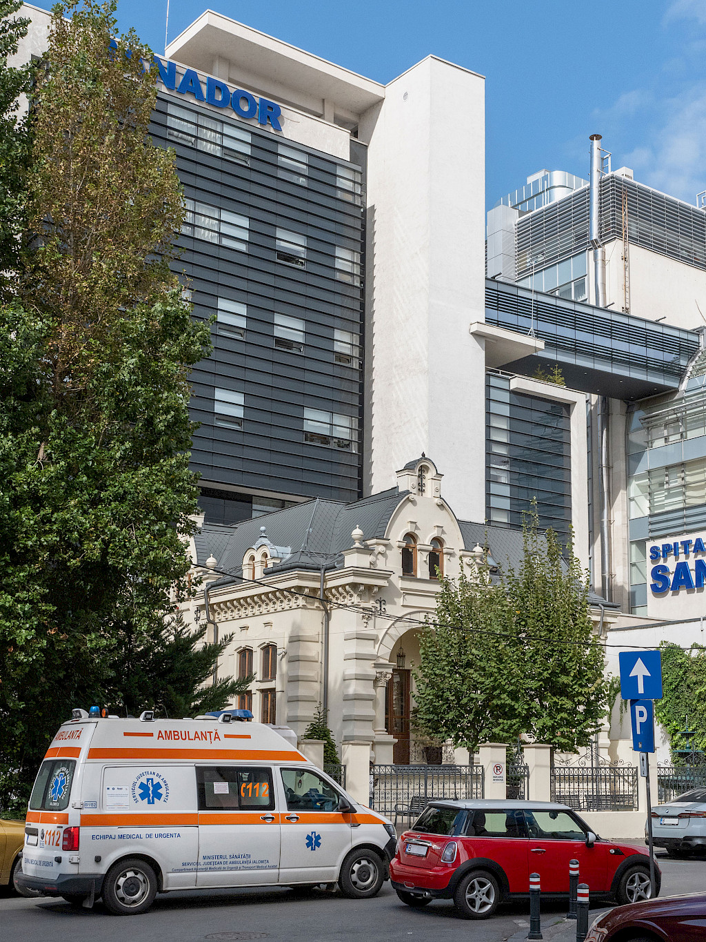 The Sanador Clinic in Bucharest, with an ambulance in the foreground